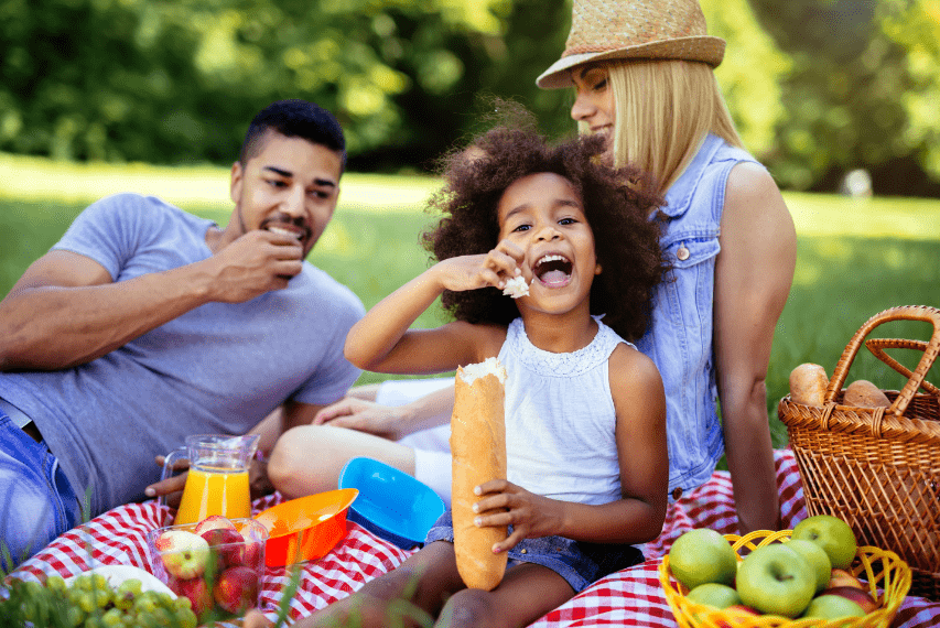 family having picnic in park